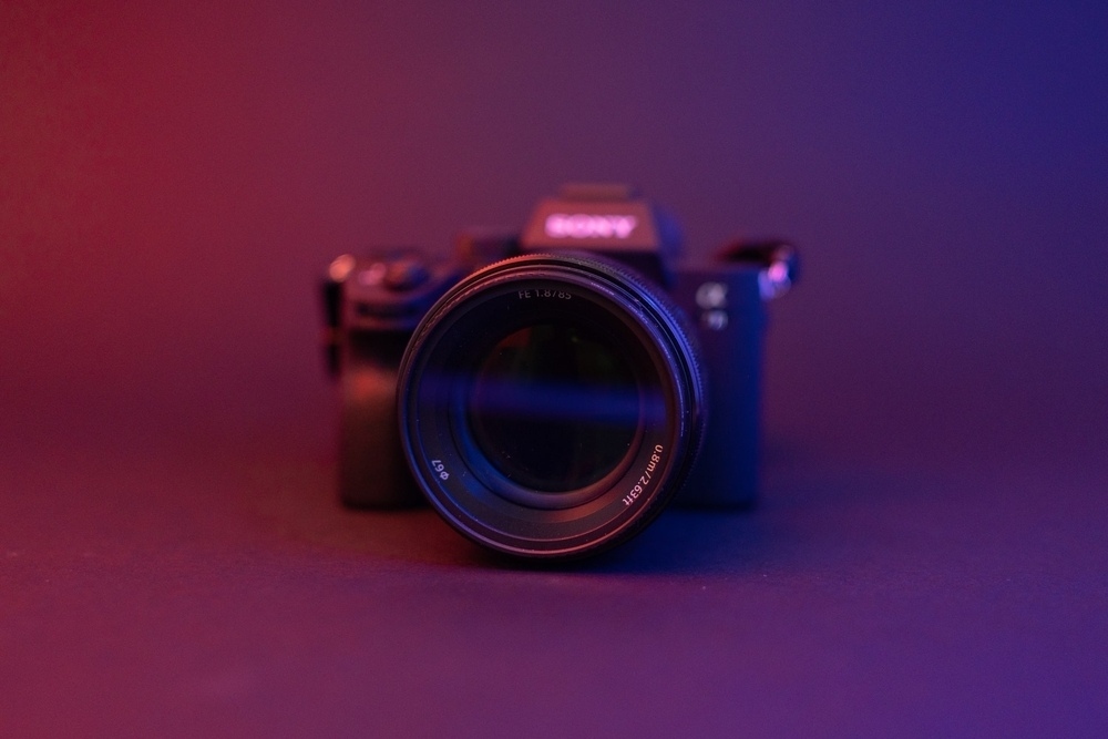 Black Camera on White Silky Cloth: A Perfect Blend of Style and Elegance